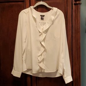 Cream blouse with ruffle detail